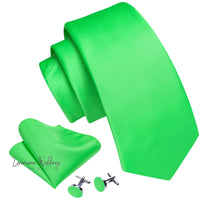 a bright green tie and matching cufflinks