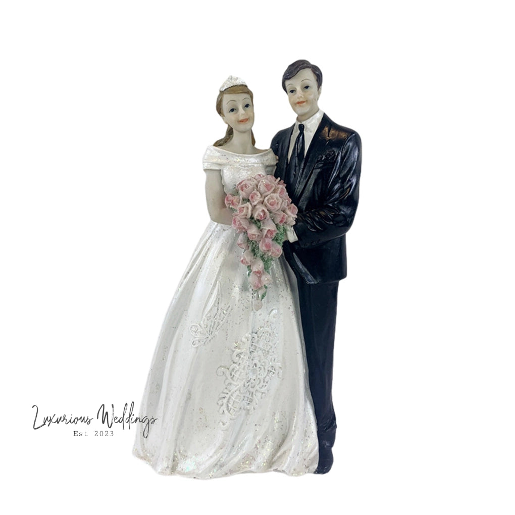a figurine of a bride and groom