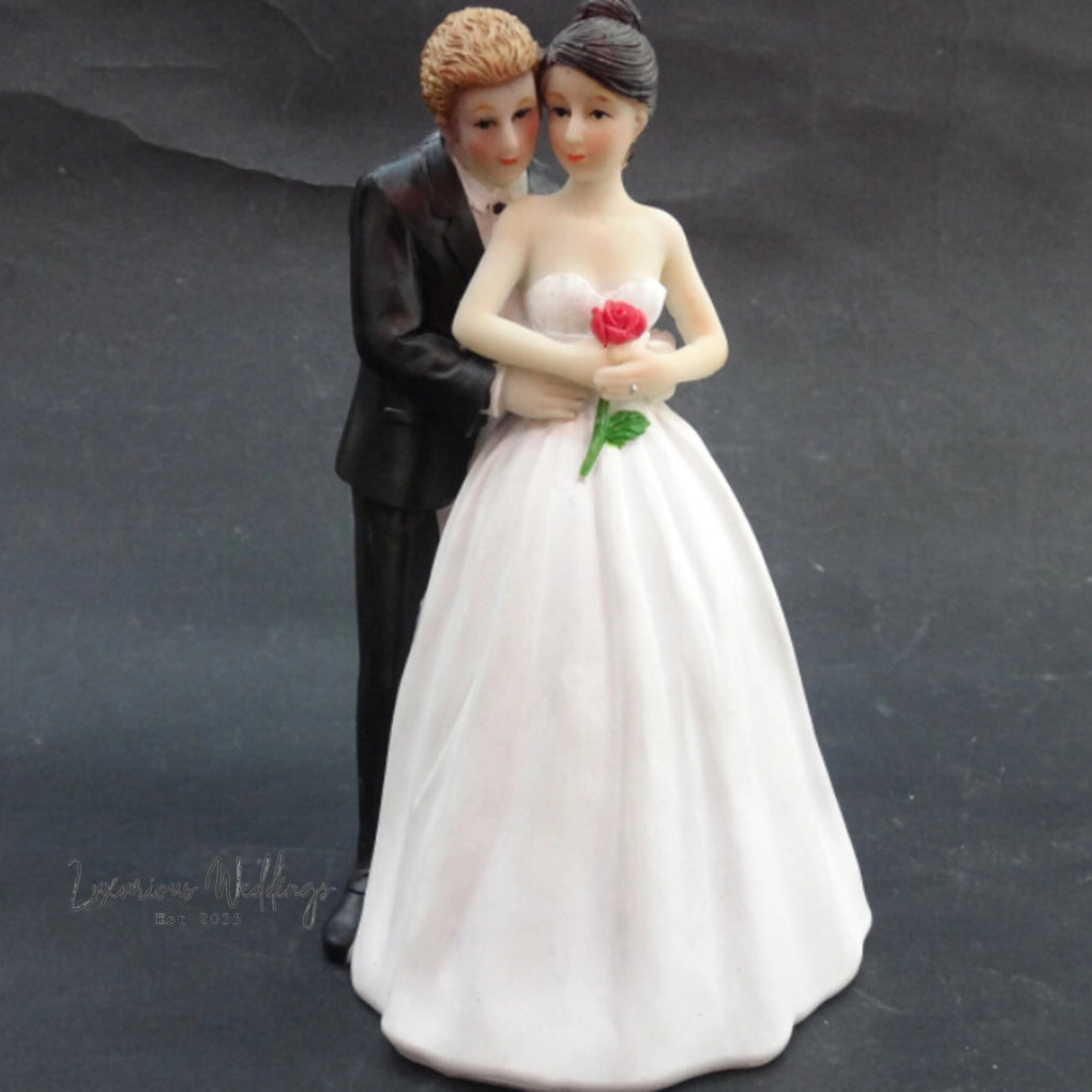 a figurine of a bride and groom
