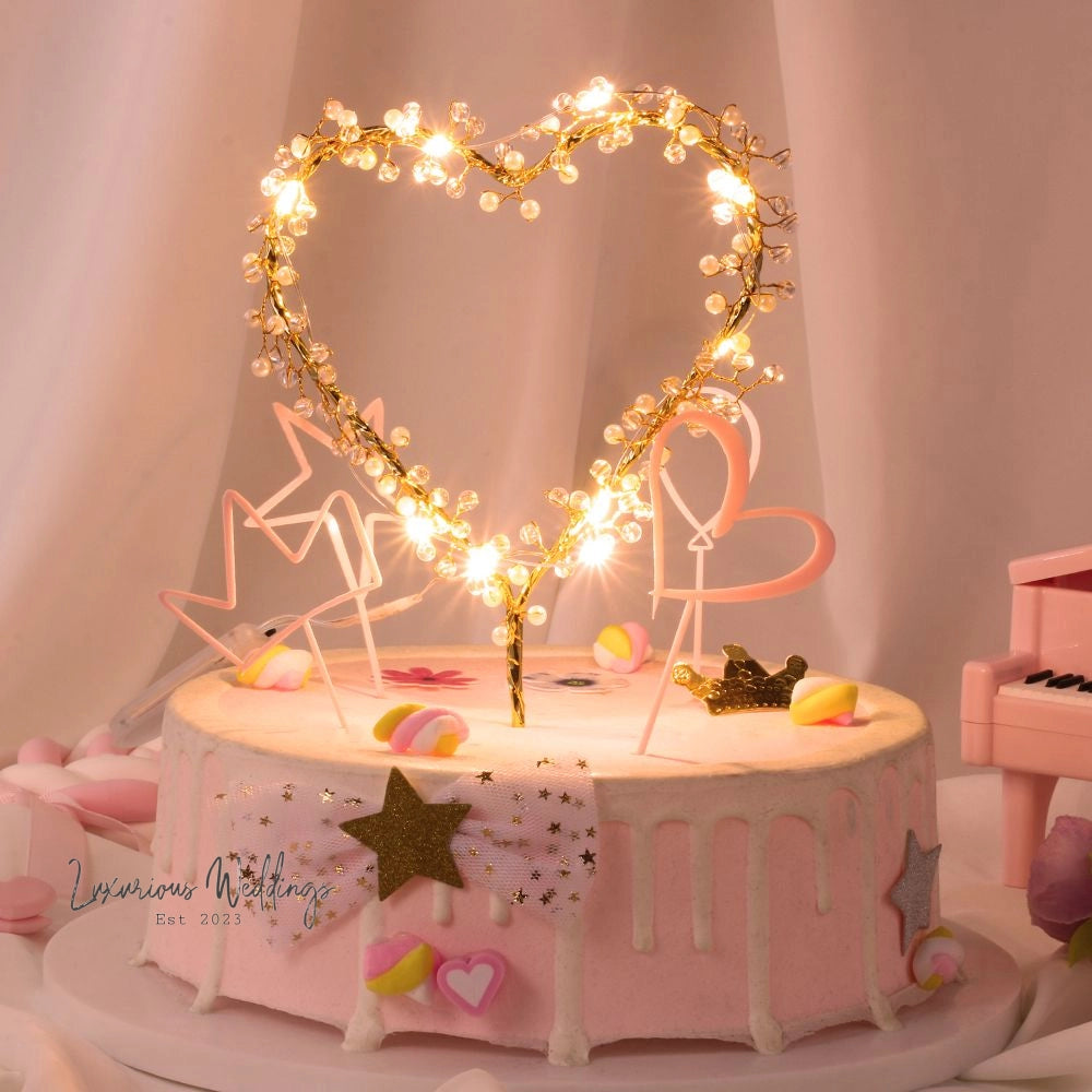 a cake with a heart shaped decoration on top of it