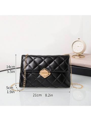 a black purse with a chain and a clock