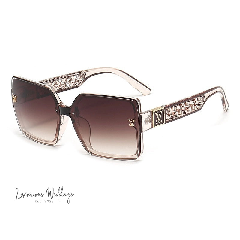 a women's sunglasses with a diamond embellishment