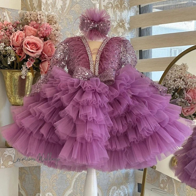 a mannequin with a purple dress on display