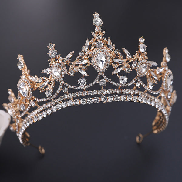 a tiara is shown on a black surface