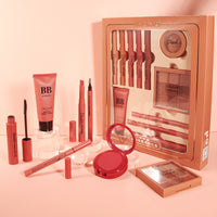 an assortment of beauty products displayed in a box