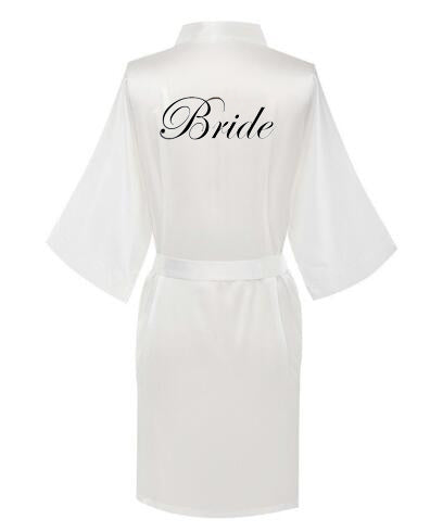 a white robe with the word bride on it