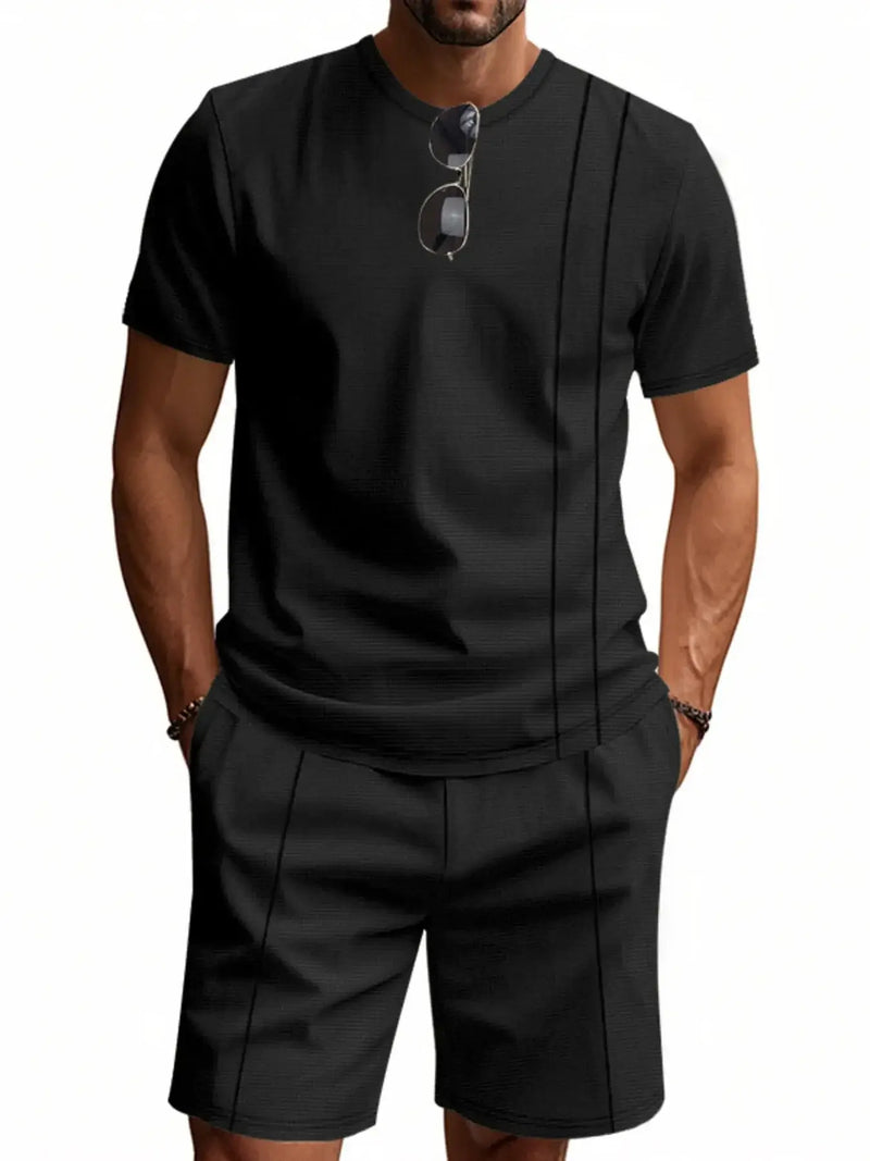 Men's black round neck short sleeve top and shorts set, slightly stretchy, features pockets, stylish casual wear.