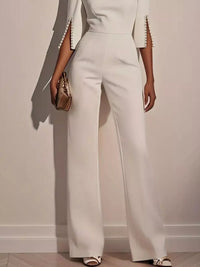 Wide-Leg Jumpsuit with Slit Sleeve in white featuring stylish slit sleeves and a sophisticated design.
