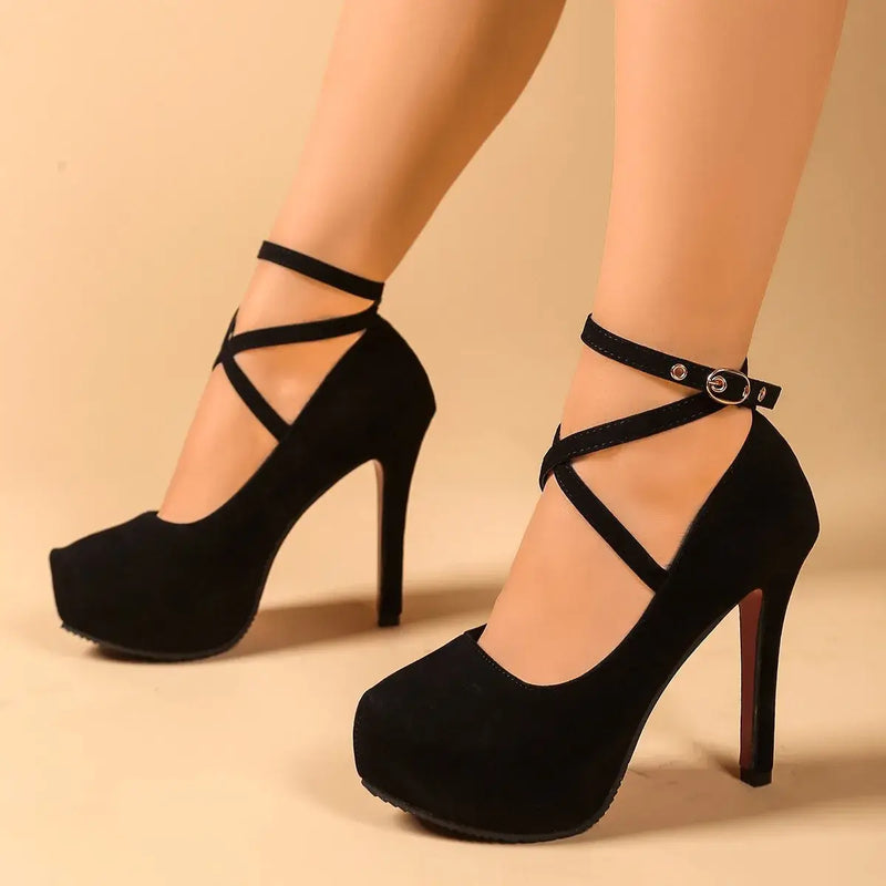 Black ankle strap high heel pumps made of suede, perfect for luxurious weddings and formal occasions.