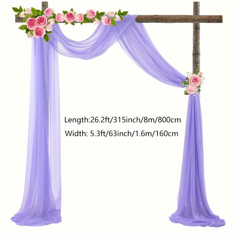 a purple wedding arch with flowers on it