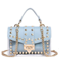 Elegant blue handbag with studs and chain strap, perfect for luxurious weddings and stylish occasions.