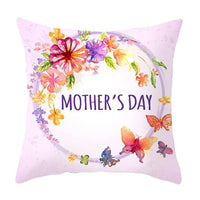 a mothers day pillow with flowers and butterflies on it