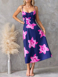 Floral Print Midi Cami Dress featuring bold pink floral design and a stylish ruched bodice on a navy background.