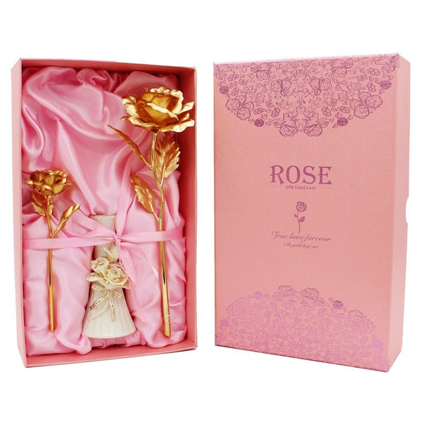 a pink box with a rose in it