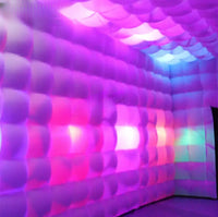 a room that has a wall made out of balloons