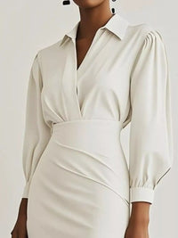 Ruched Midi Shirt Dress with Side Slit featuring a stylish wrap design and elegant puff sleeves.