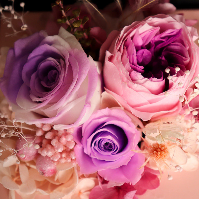 a close up of a bouquet of flowers on a table