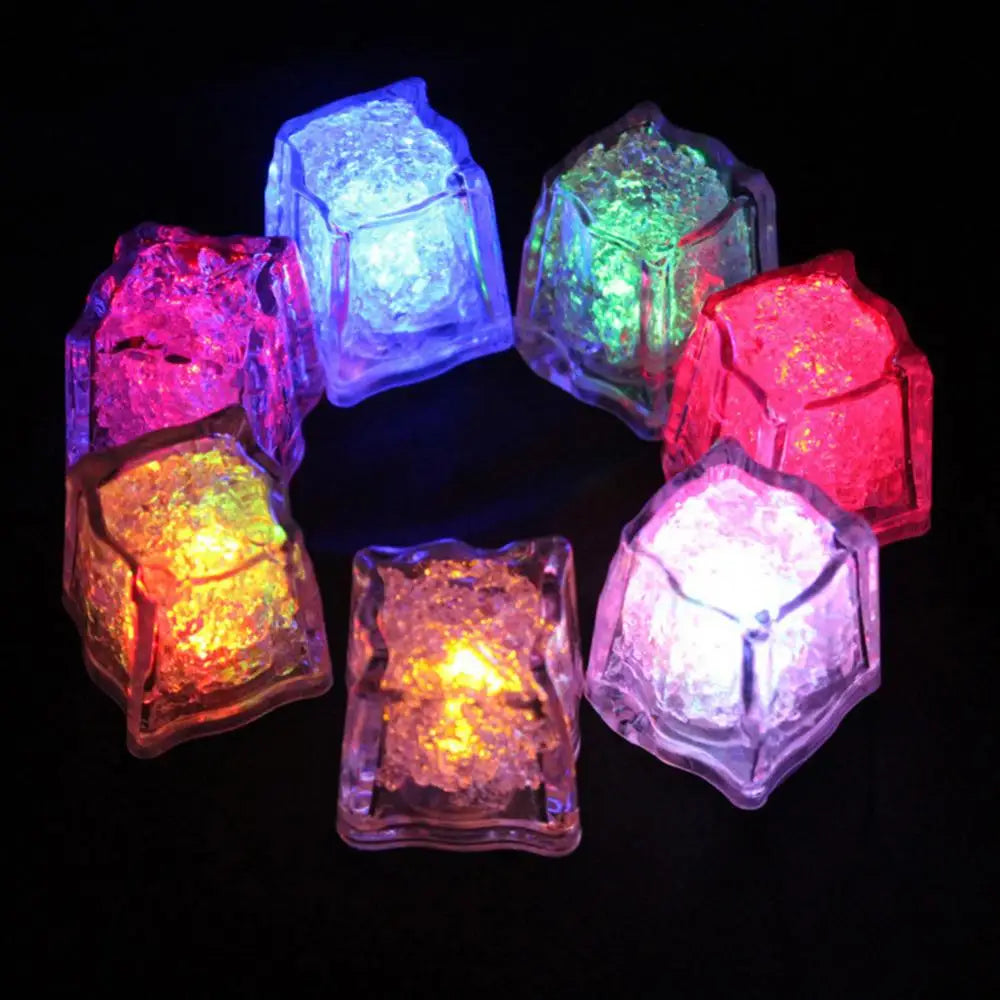 a group of glowing cubes sitting on top of a table