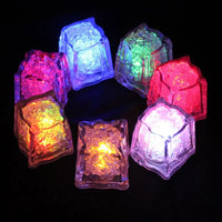 a group of glowing cubes sitting on top of a table