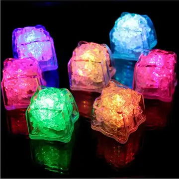 a group of colorful lights sitting on top of a table
