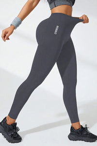 High waist active leggings in dark gray, showcasing high stretch material for fitness and comfort.