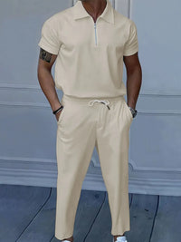 Men's beige quarter zip polo and pants set, featuring drawstring and pocket, ideal for formal wear in NZ.