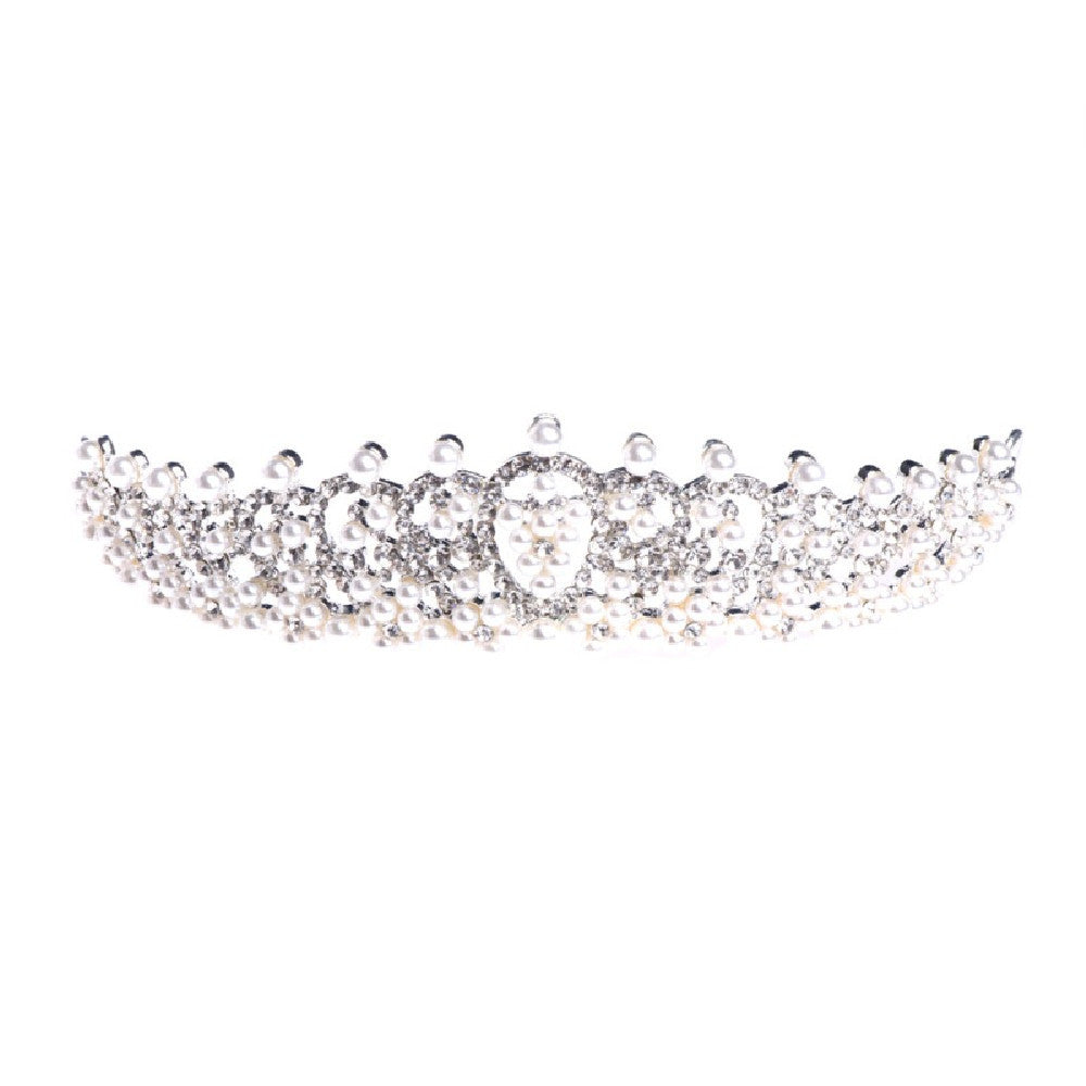 a tiara with pearls and a heart
