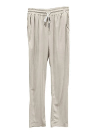 Light beige drawstring pants with pockets, made of slightly stretchy polyester and spandex blend.