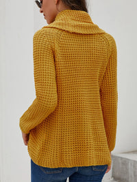 Back view of a mustard yellow textured turtleneck long sleeve sweater for plus sizes, showcasing its cozy fit and stylish design.