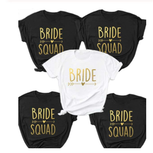 six bride squad shirts with gold lettering on them
