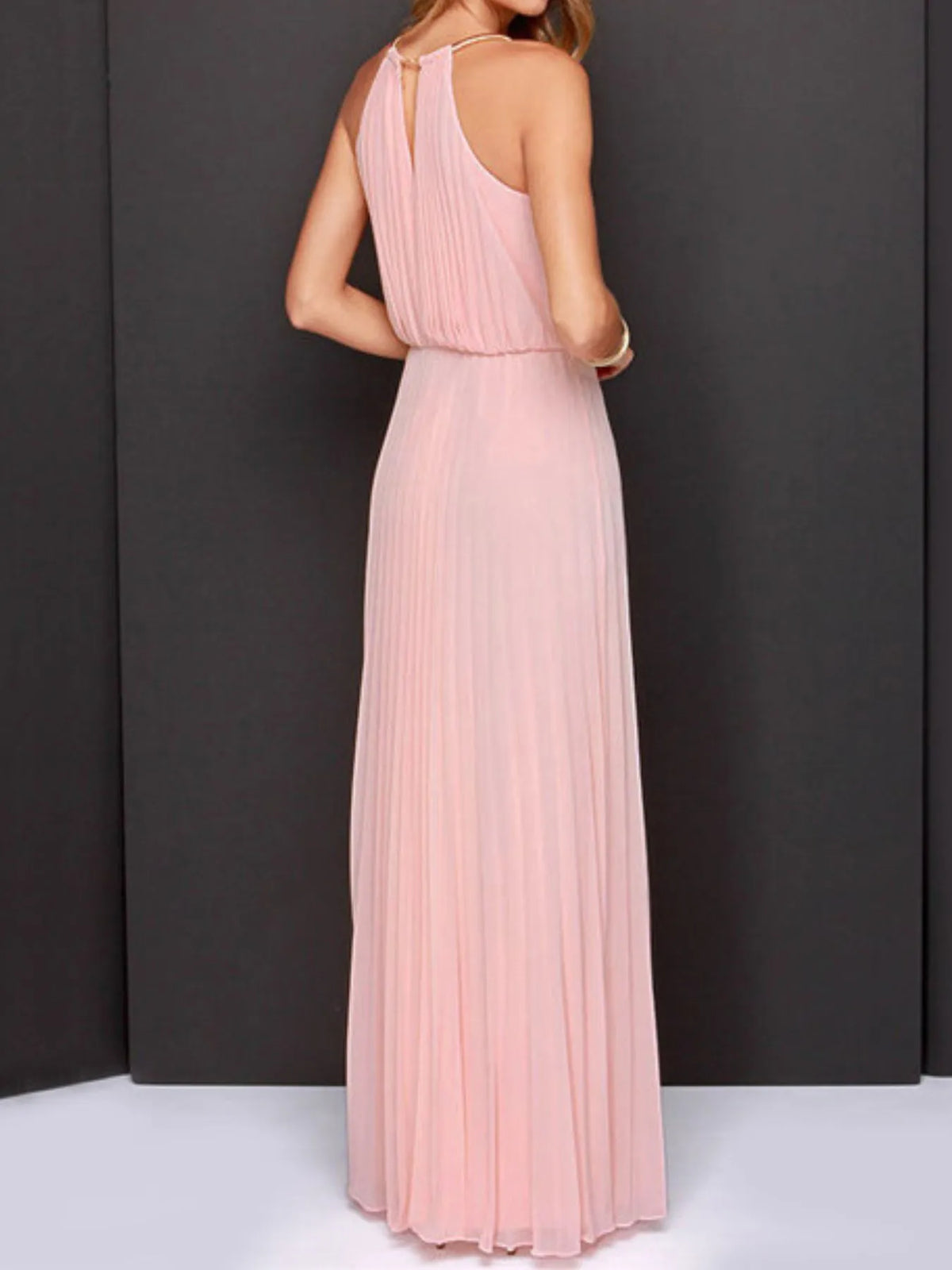 Back view of a pleated sleeveless maxi tank dress in soft pink, ideal for affordable formal wear in NZ.
