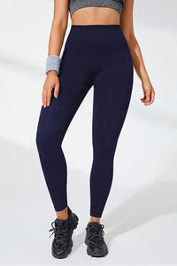 High waist active leggings in navy, featuring a stretchy fit and suitable for workouts. Machine washable.