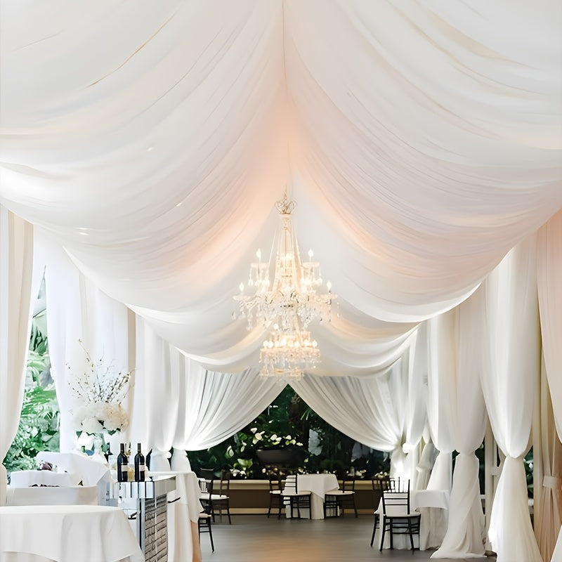 a banquet hall with a chandelier and tables