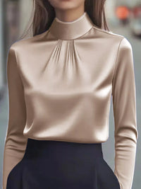 Mock Neck Long Sleeve Blouse with Pleated Detail in beige satin fabric.