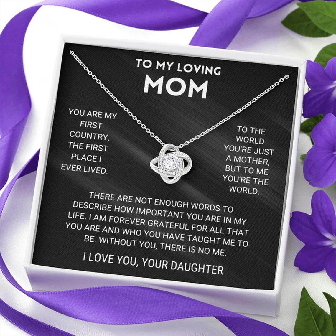 a mother's necklace with a poem on it