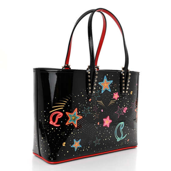 Stargazer Handbag with studs, blending celestial elegance and streetwise style for luxurious wedding outfits.