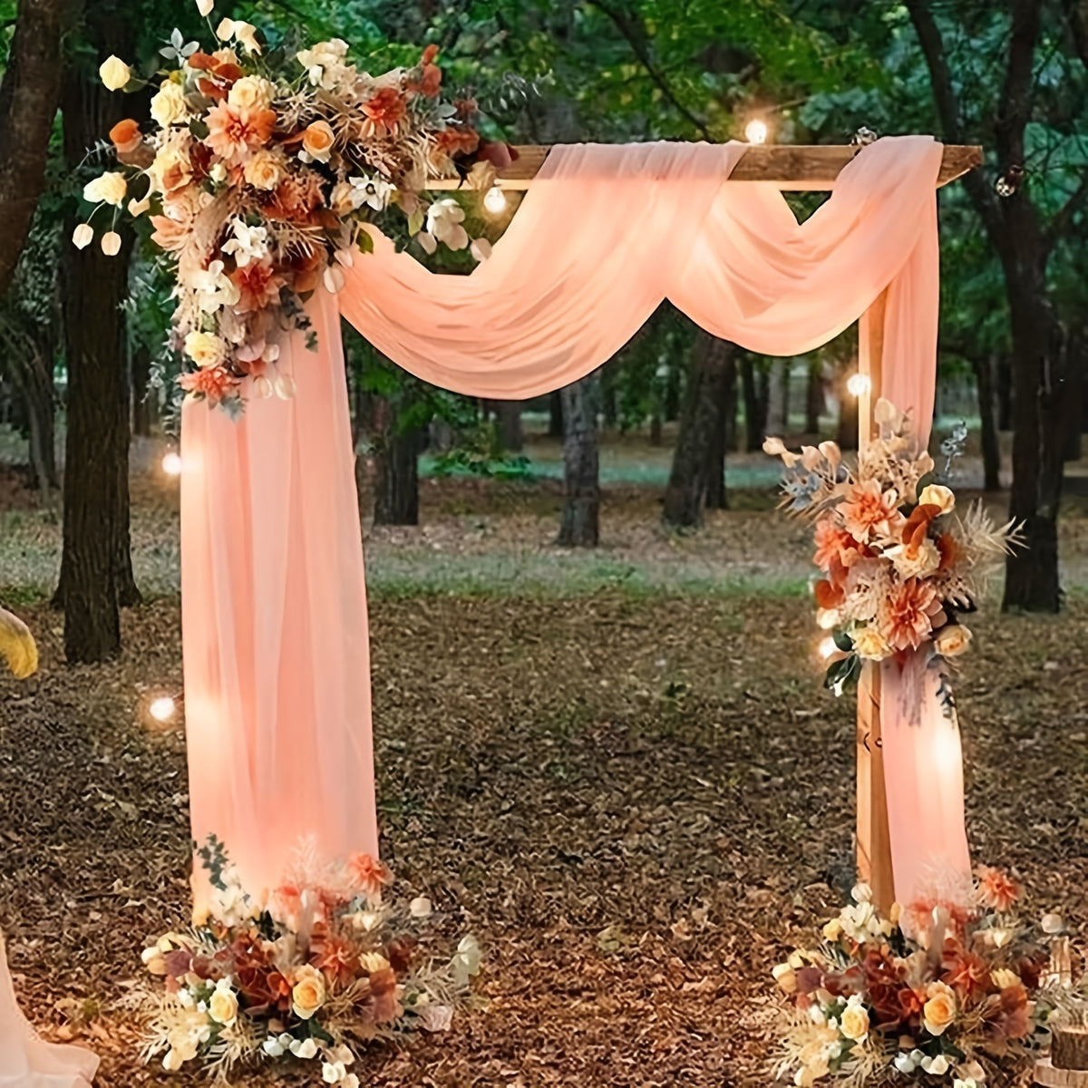 a wedding arch decorated with flowers and lights