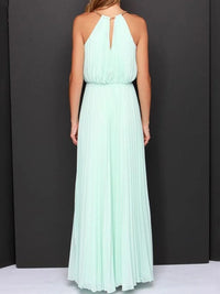 Back view of a pleated sleeveless maxi tank dress in mint green, showcasing its elegant design and flowing fabric.