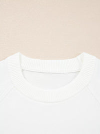 MERRY Letter Pattern Christmas Raglan Sleeve Sweater close-up of neckline in white fabric