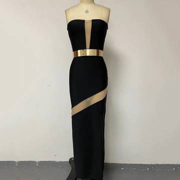 a black and gold dress on a mannequin