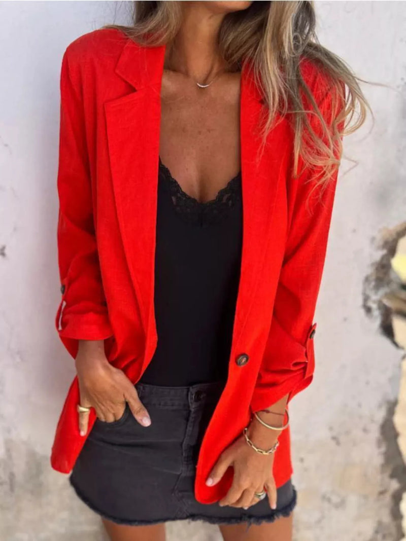 Full size lapel collar long sleeve blazer in vibrant red, styled with a black top and denim skirt.
