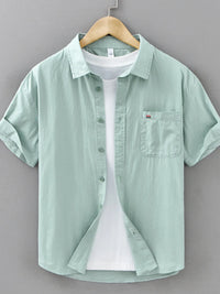 Men's plus size short sleeve plaid button-up shirt in mint green with pocket, perfect for casual wear.