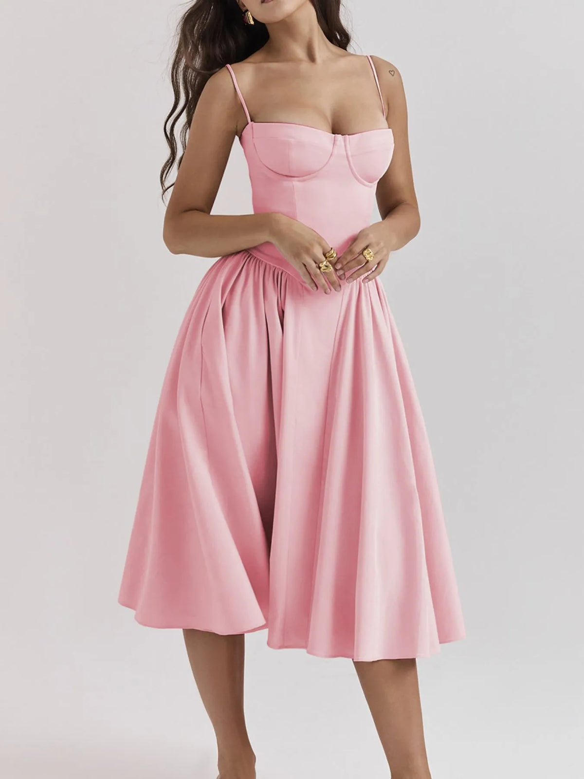 Ruched sweetheart neck cami dress in pink, featuring a fitted bodice and flowing skirt, ideal for casual outings.