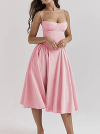 Ruched sweetheart neck cami dress in pink, featuring a fitted bodice and flowing skirt, ideal for casual outings.