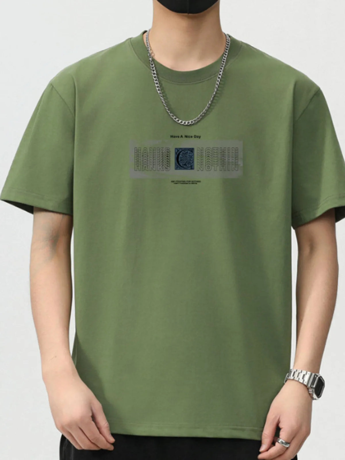 Men's green short sleeve t-shirt featuring graphic design, casual style, perfect for everyday wear.