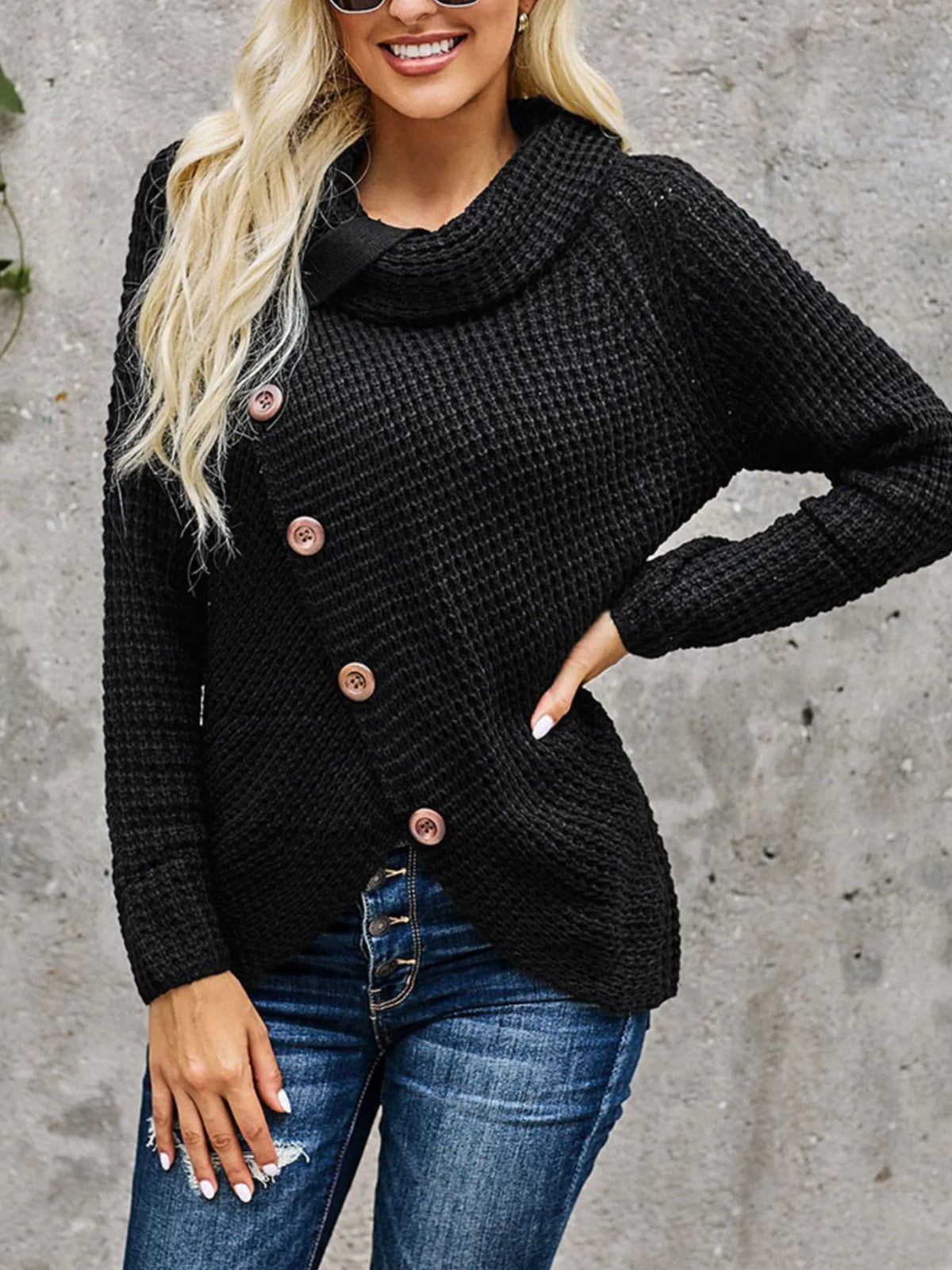 Black full size texture turtleneck long sleeve sweater with decorative buttons, styled with jeans.