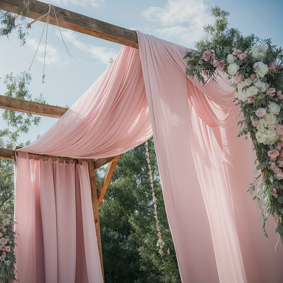 a pink drape draped over a wooden structure