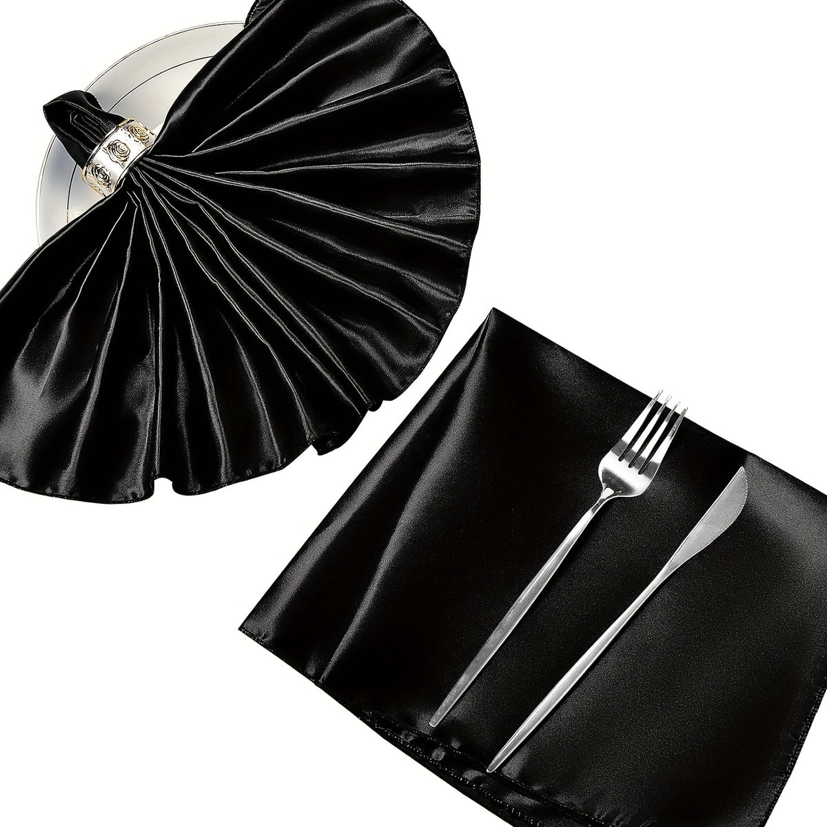 a black table cloth with a fork and knife on it
