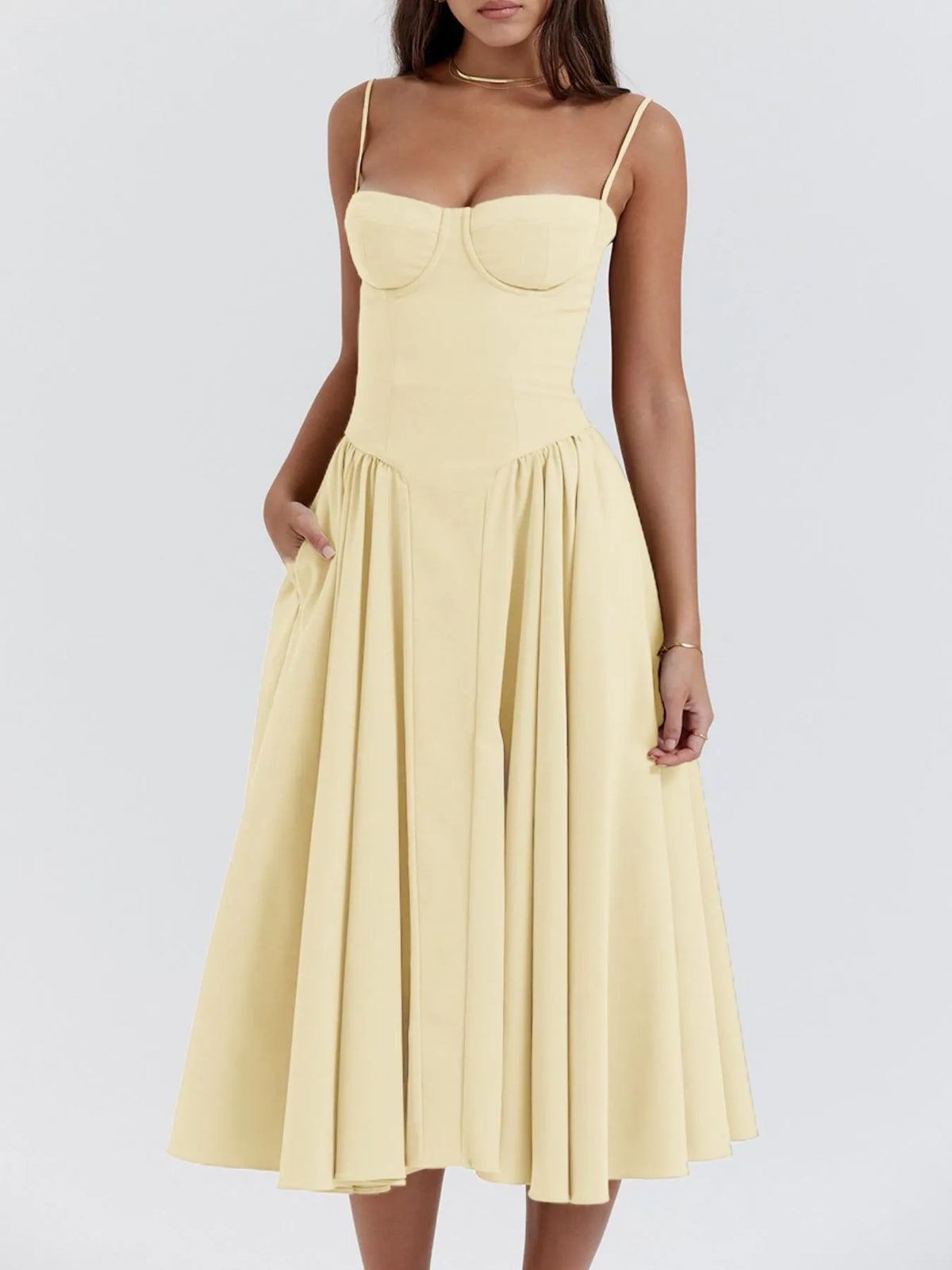 Ruched sweetheart neck cami dress in yellow, featuring a flattering fit and flowy skirt.