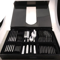 a set of silverware in a black case